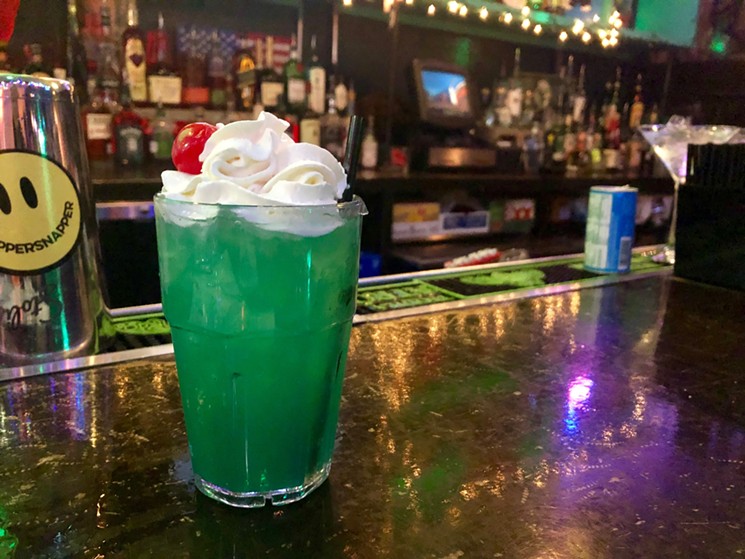 Stewie's Cool Hwhip, $9, is face-puckeringly sweet with rum, blue curacao, Cruzan coconut rum and pineapple juice. - TAYLOR ADAMS
