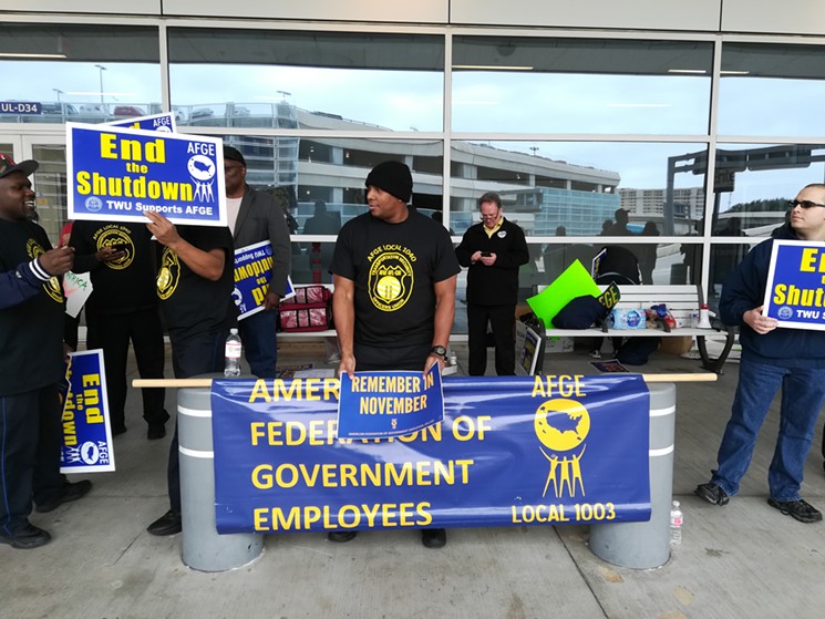 Protests in support of TSA agents at DFW Airport on Jan. 16, 2019. - STEPHEN YOUNG