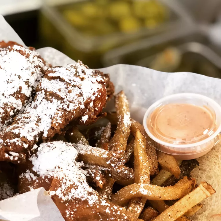 Daddy Mac’s Sugar Daddy Wings are glazed with honey-maple and dusted with powdered sugar. - DEAH MITCHELL