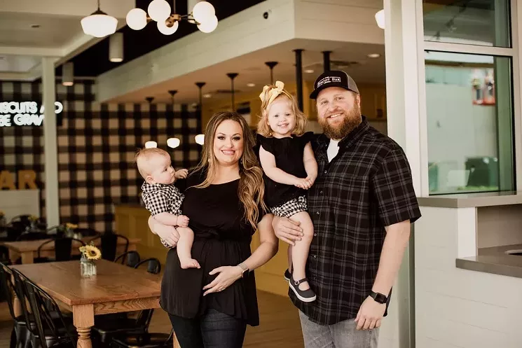 Janie (left) and Jake Burkett and their two children. They started the restaurant after Janie lost two children during a triplet pregnancy. - COURTESY MESHALI MITCHELL