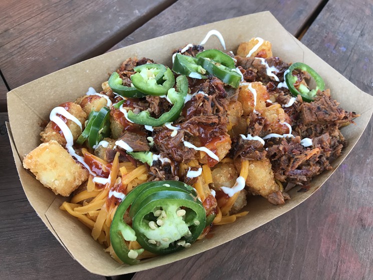 Behold Bumbershoot's tater tots loaded with brisket and cheese. - DALILA THOMAS