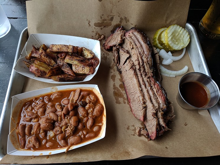 Bonus mini-review: Cowtown Brewing's brisket and skillet potatoes are solid, but the real star is the baked beans stewed with big chunks of fatty brisket. - BRIAN REINHART