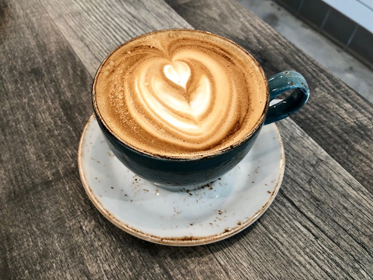 The flat white, a classic Australian coffee creation similar to a latte - PAIGE WEAVER