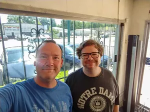 The small interior is just large enough for an awkward, two-person selfie. (Pictured here are Philip Kingston and TC Fleming.) - PHILIP KINGSTON