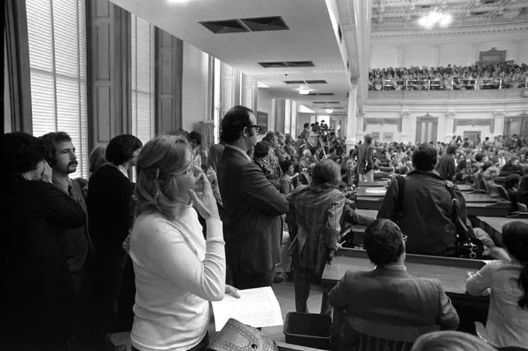 Texas political writer Molly Ivins covers a story for The Texas Observer on the floor of the Texas Legislature. - COURTESY MAGNOLIA PICTURES