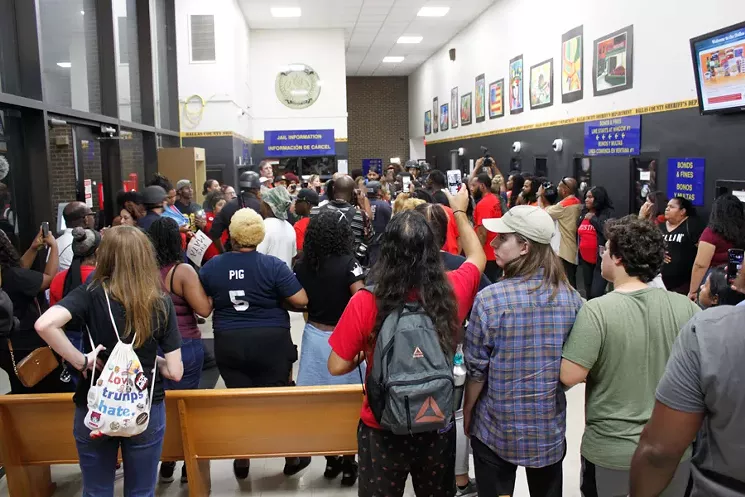 A little more than half of the protesters attempted to rush the courthouse but only got as far as the lobby before police escorted them out. - NICK BOSTICK