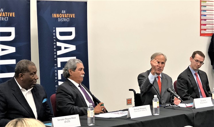 Left to right, state Sen. Royce West, Dallas ISD Superintendent Michael Hinojosa, Texas Gov. Greg Abbott and Texas Education Commissioner (and former DISD trustee) Mike Morath, at an event celebrating the successes achieved by the Dallas public school system - JIM SCHUTZE