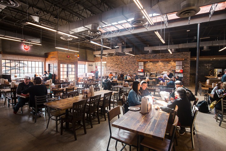 Terry Black's sports plenty of dining space both inside and out at their Deep Ellum establishment. - CHRIS WOLFGANG