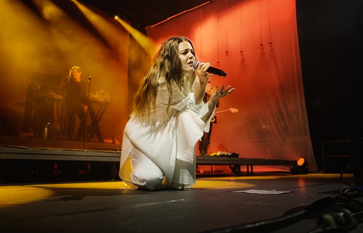 Maggie Rogers was on her knees asking audience members to REGISTER TO VOTE. - MIKE BROOKS