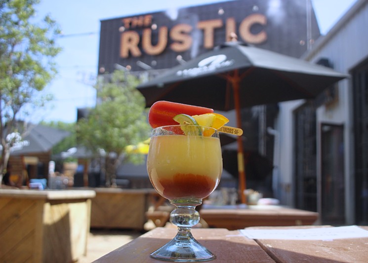 The Rustic's featured margarita pops thanks to the Sangria Social Ice Popsicle they plop into it. Try one at their pop-up market this weekend. - SUSIE OSZUSTOWICZ