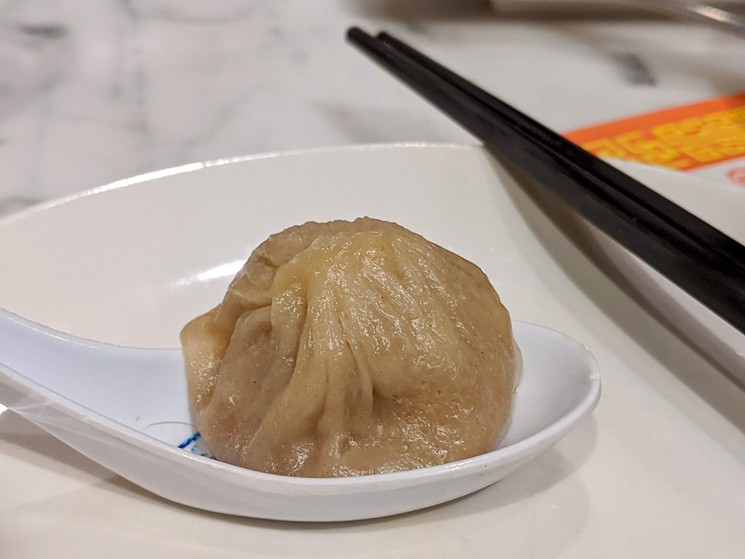 A single soup dumpling waits to be devoured at Royal China. - BRIAN REINHART