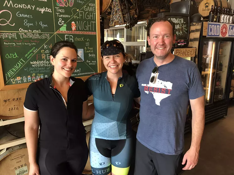 Cyclists at BrainDead Brewing: Kristie Holt (a frequent advocate for better bike infrastructure) is center. The author is on the left, and former City Council member and fellow food writer Philip Kingston is on the right. - TAYLOR ADAMS