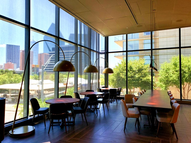 The bar area in the upstairs dining room has a great view of downtown Dallas. - KRISTINA ROWE