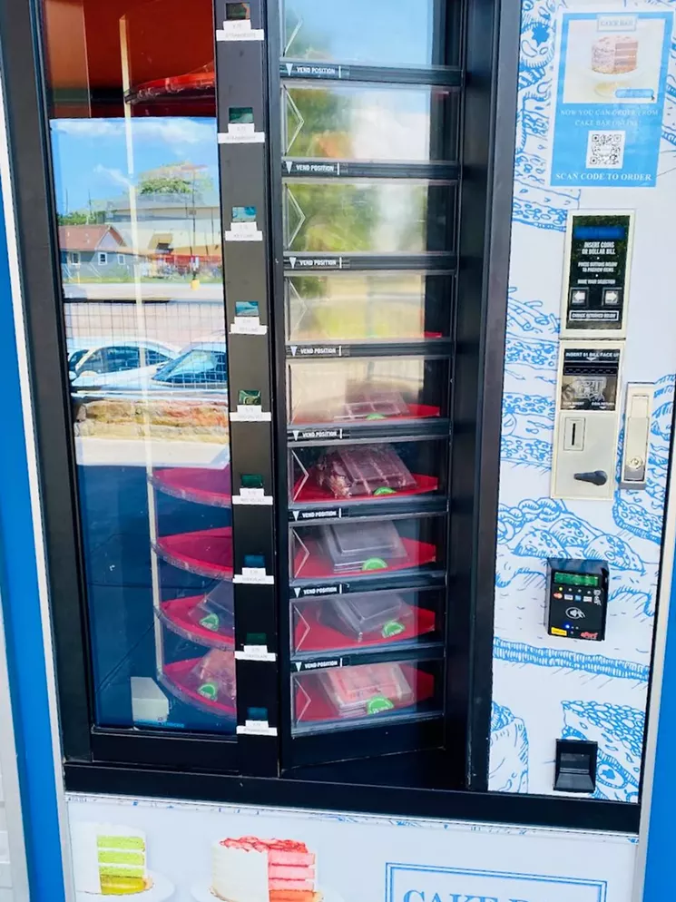 The cake vending machine outside the Cake Bar takes dollars, quarters or plastic. - LAUREN DREWES DANIELS