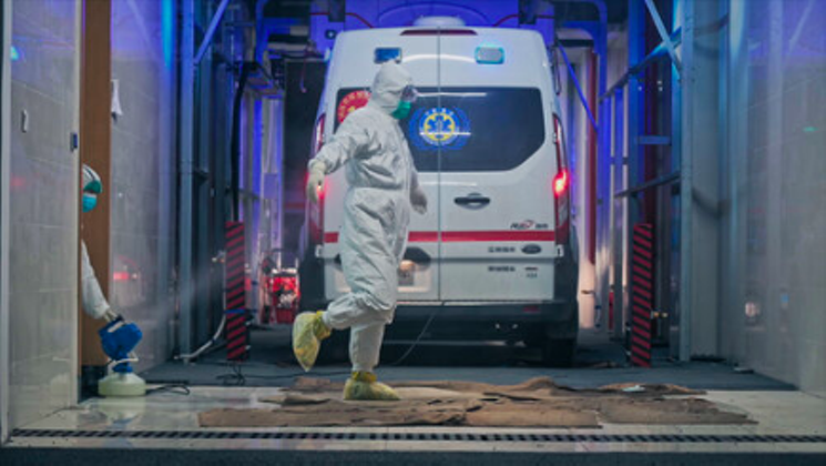 Cleaning crews sterilize the grounds of a Wuhan hospital in China from a scene from director Ai Weiwei's documentary Coronation , which will be part of this year's DocuFest. - DOCUFEST/AWW GERMANY