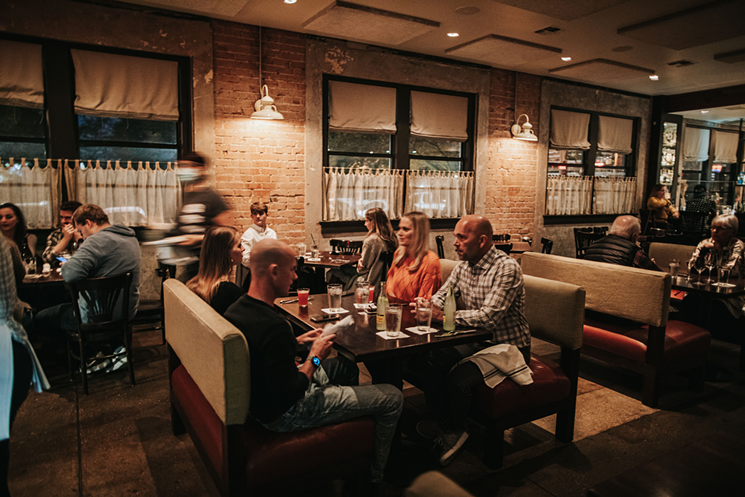 Boulevardier is keeping the windows in its space open this winter to keep air flowing for customers. - XOCHITL GONZALEZ