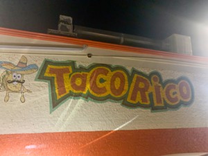 The exterior of Taco Rico on that first early nightfall of autumn. - TAYLOR ADAMS