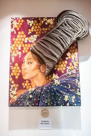 A piece by Youveline Joseph, whose work on the subject of hair is showcased in the exhibition Hair Stories. - LASHONDA COOKS