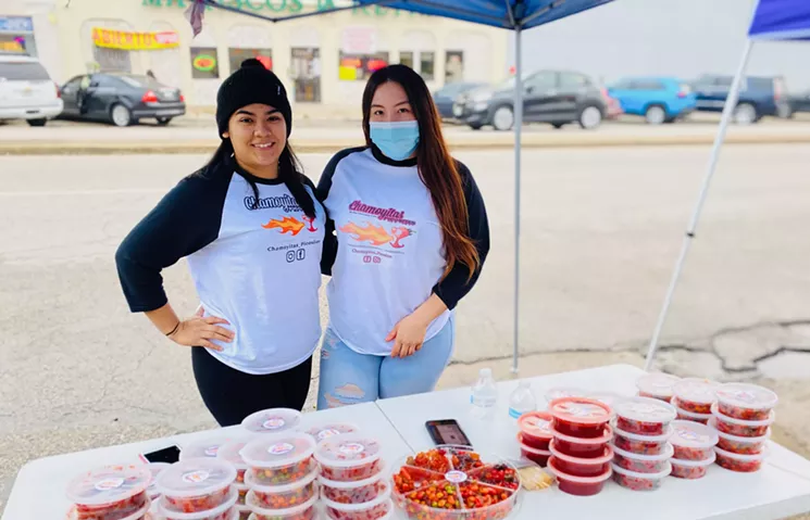 On the right, Esmeralda Sanchez and her cousin Karen Ramirez, left, selling candy last weekend. - LAUREN DREWES DANIELS