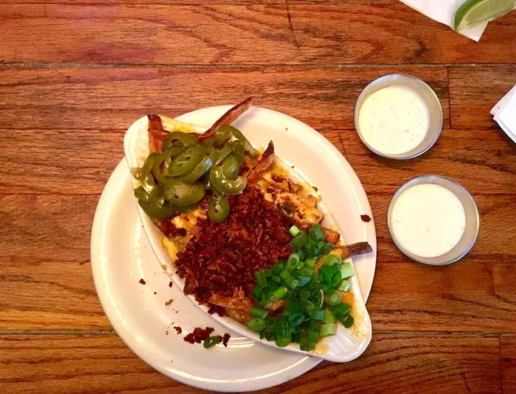 Fully loaded cheddar fries from Snuffer's are the epitome of game-day eating, so just tell your gallbladder to STFU and enjoy. - NICK RALLO