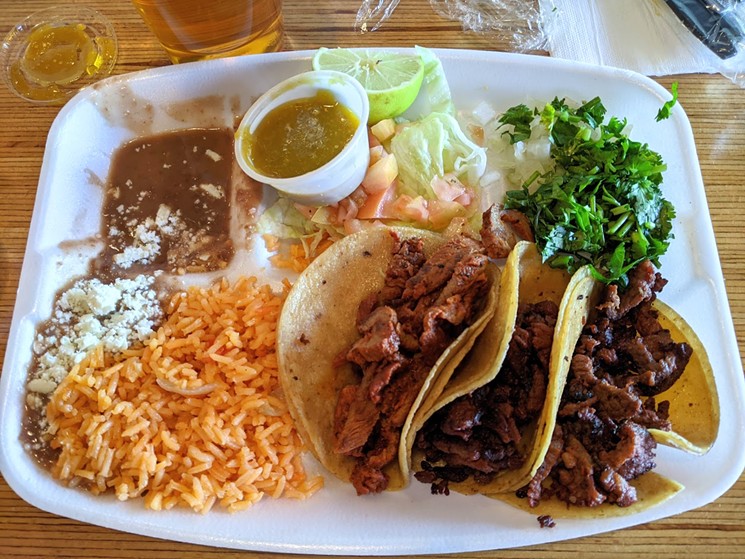A plate of beef fajita tacos from Tacos La Gloria, served on its opening weekend at Oak Cliff Brewing Co. - BRIAN REINHART
