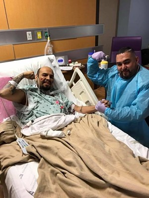 GSpook (left) gets a visit from friend George Redd Speaks (right) during the Dallas DJ's hospital visit in 2017. - COURTESY OF GEORGE REDD SPEAKS