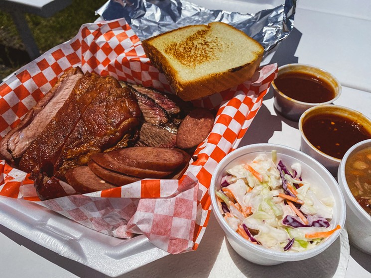 The Texas Trinity of barbecue (brisket, ribs and sausage) courtesy of Harris Bar-B-Que. - CHRIS WOLFGANG