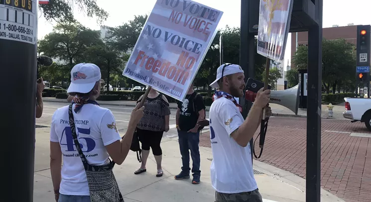 Kevin Stearns (right) is with a group called J Project. One of their main goals is to prove Prince, the musician, was murdered. - JACOB VAUGHN