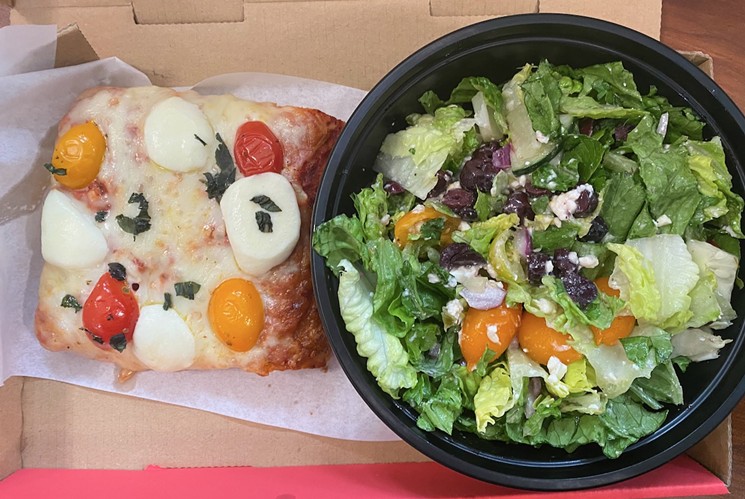 Margherita pizza and Greek salad; surprisingly fresh and flavorful lunch from a quick-serve spot. - LAUREN DREWES DANIELS