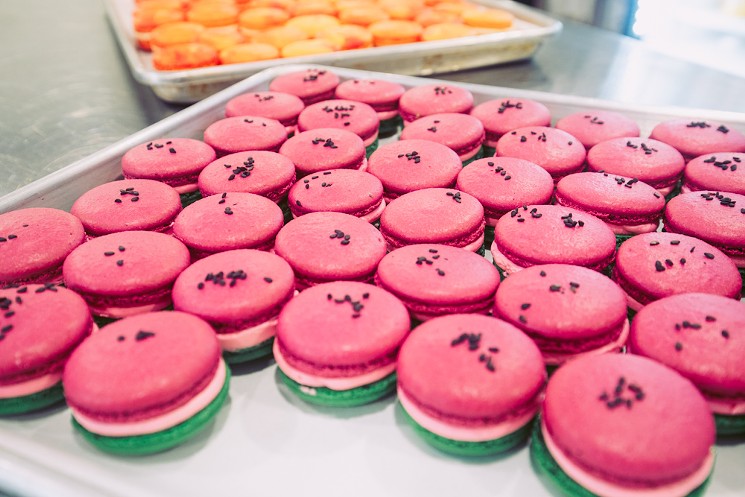 Watermelon macarons in front and mango macarons in the back are two summer flavors of macarons that are coming soon to Ollio Patisserie. - CHRIS WOLFGANG