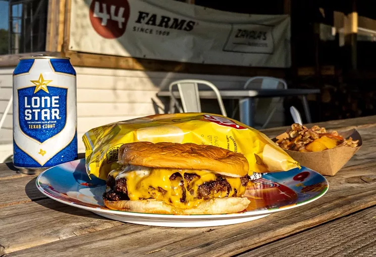 Zavala's serves their burgers on a plastic McDonald's plate because it tastes better that way. - SEAN WELCH