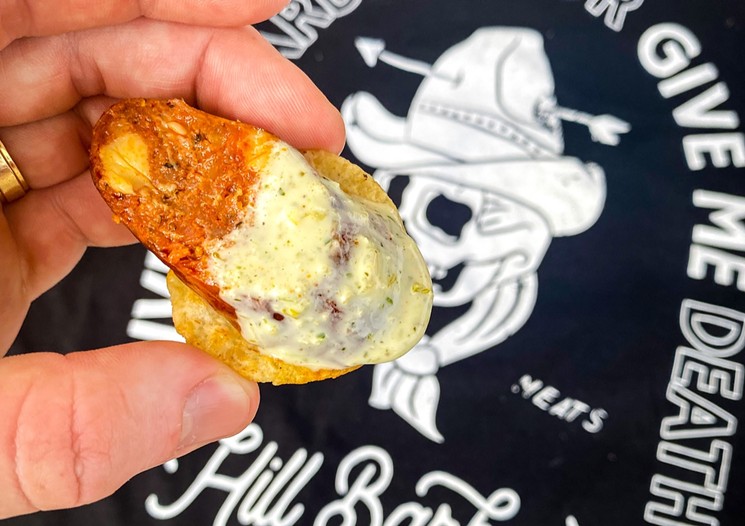 Hill Barbecue's chorizo bite on a chip with jalapeño ranch sauce. - SEAN WELCH