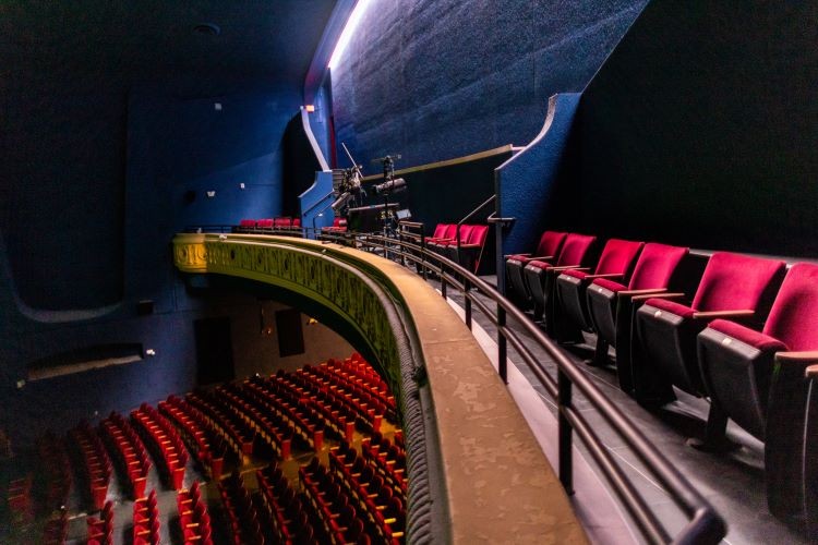 Crews converted the Texas Theatre's second-floor balcony into a second screening room and a row of chairs for the movie house's main screen. - KATHY TRAN