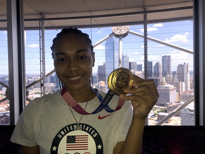 Allisha Gray brought her Olympic gold medal from the 2021 Summer Olympics in Toyko, Japan to a press conference in Reunion Tower. - DANNY GALLAGHER