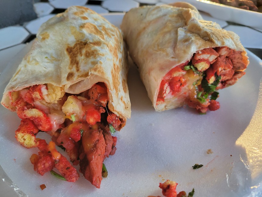The LA-style burrito filled with Flamin' Hot Cheetos at Tacos La Gloria. - E MAYNE