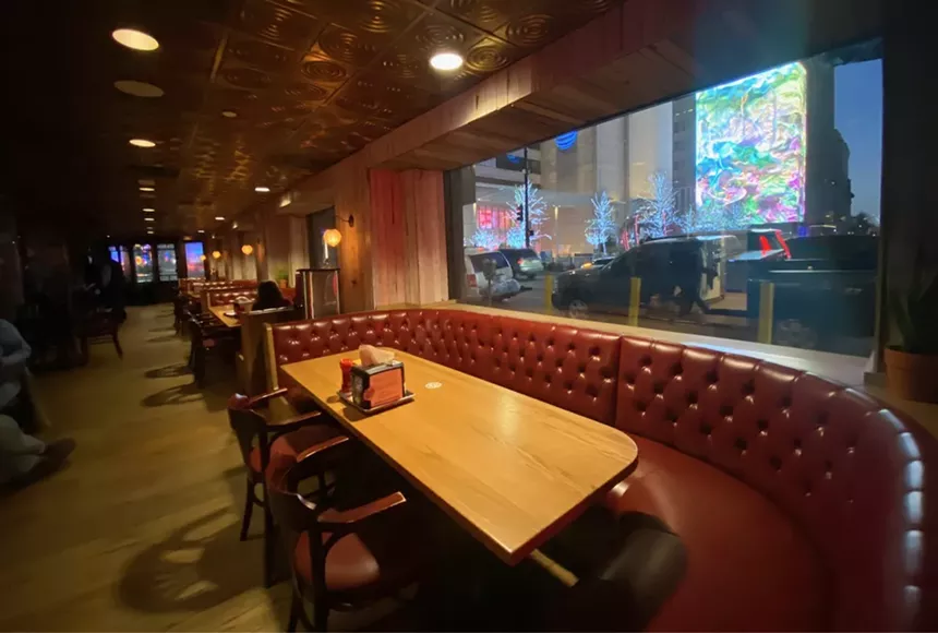 The window booths at Rodeo Bar are great for people watching. - LAUREN DREWES-DANIELS