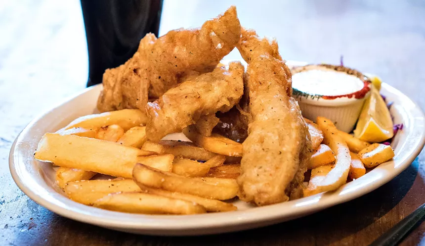 Smithwick's Red Ale, an Irish beer that's been around for centuries, is in the batter for the fish and chips at Old Monk ($13). - PHOTO COURTESY OF THE OLD MONK
