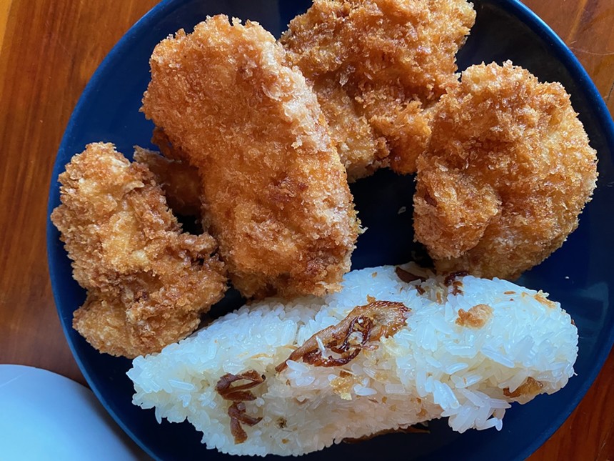 Panko-crusted chicken tenders served with sticky rice (for scale this is a small plate). - LAUREN DREWES DANIELS
