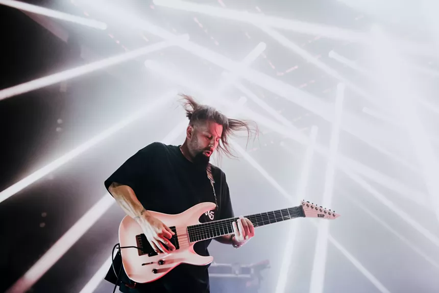 Stephen Carpenter's shredding amped up the electricity at the Deftones' show in Irving. - NATALIE PEREZ