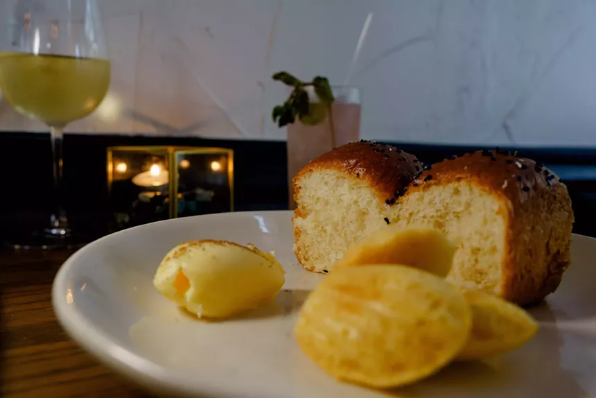 House breads; Japanese milk bread and cornbread madeleines with sea salt butter. - SEAN WELCH