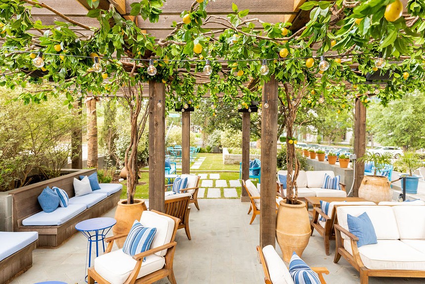 Dolce Riviera's fake tree-lined outdoor space. - KATHY TRAN