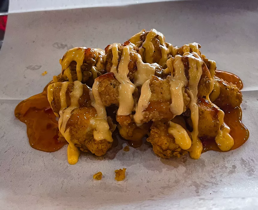 Sweet Mama nuggets drenched in Thai and Sriracha mayo.