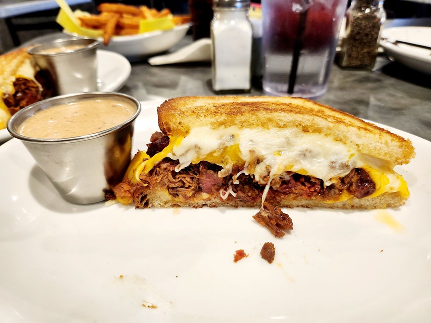 Grilled three-cheese sandwich with smoked brisket at kenny's in Dallas