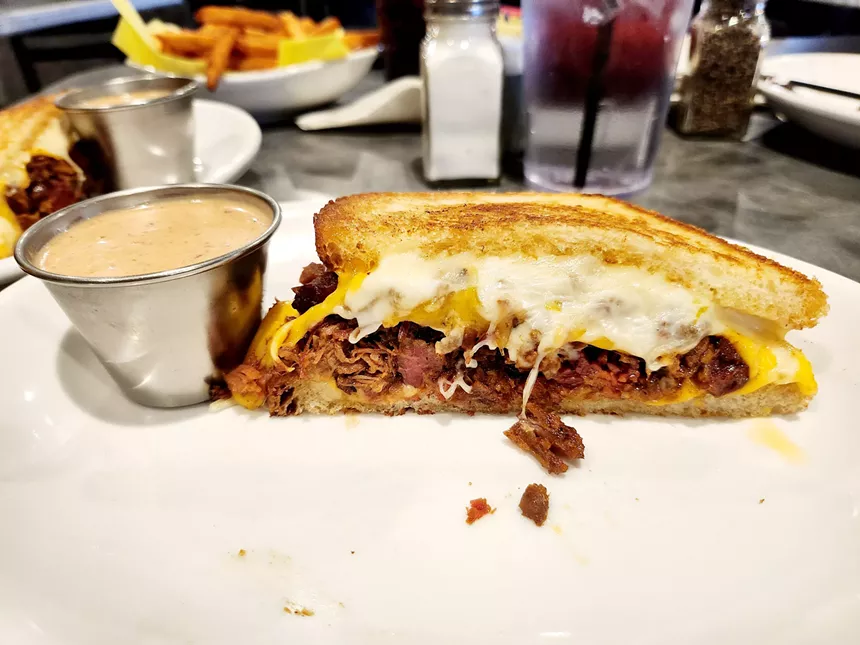Grilled three-cheese sandwich with smoked brisket at kenny's in Dallas