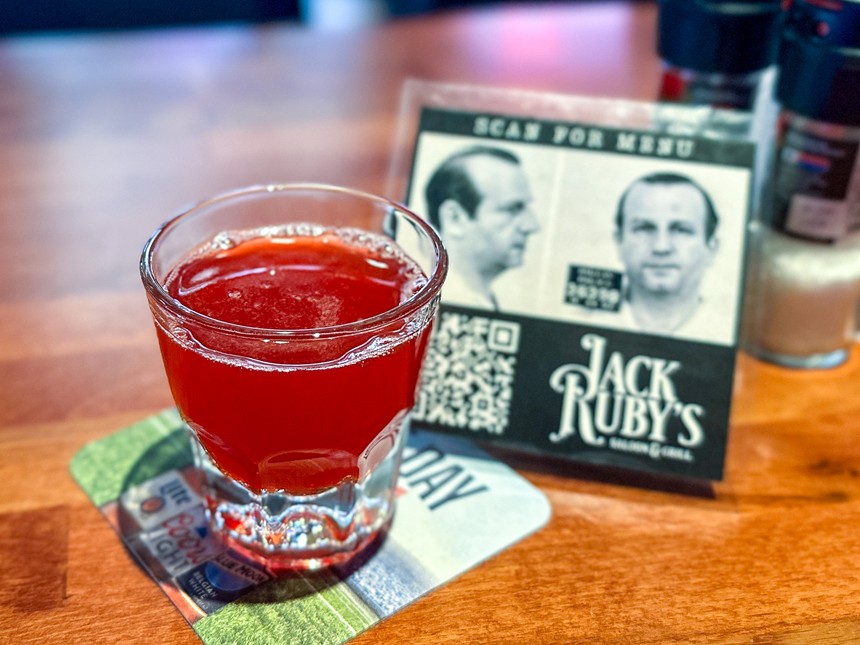 A Jack Ruby shot is bright red adn has rye and mezcal.