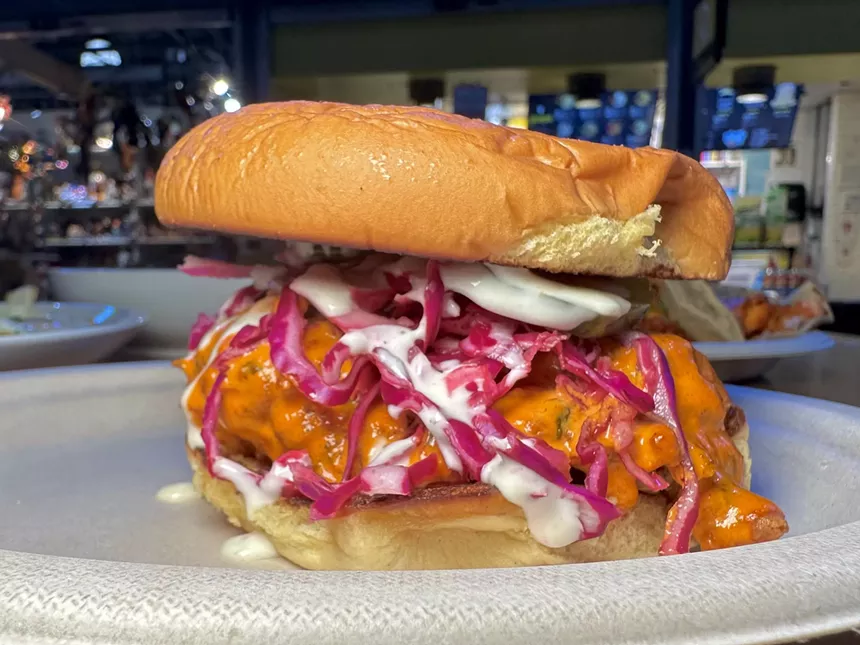 8 Cloves' fried chicken sandwich is livened with a spicy tikka sauce.