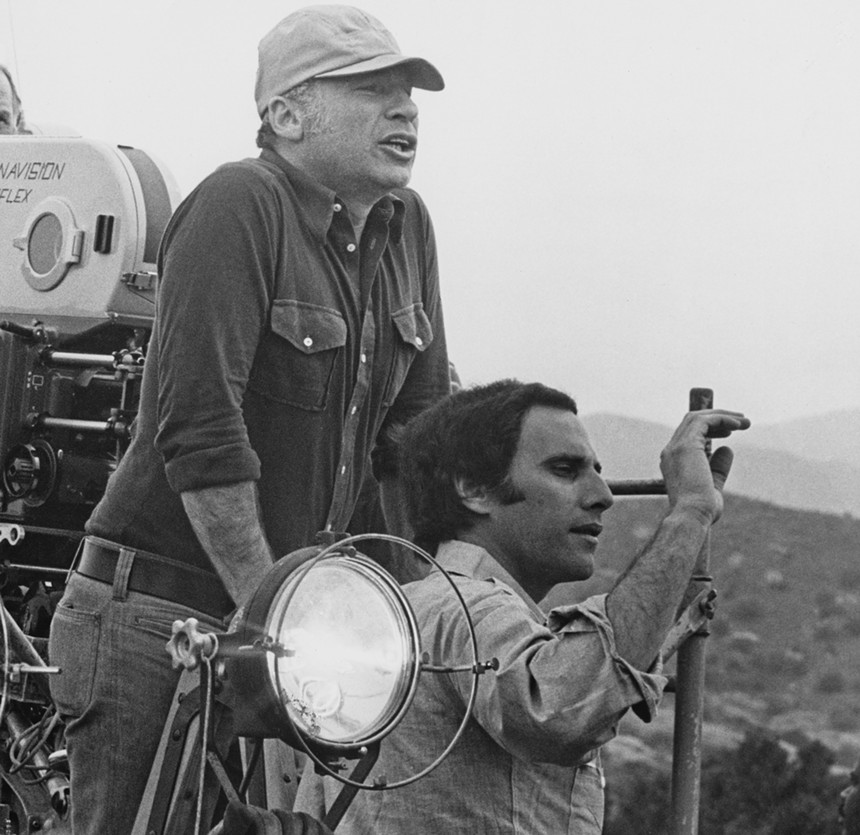 Director Mel Brooks and producer Michael Hertzberg on Blazing Saddles’ set.