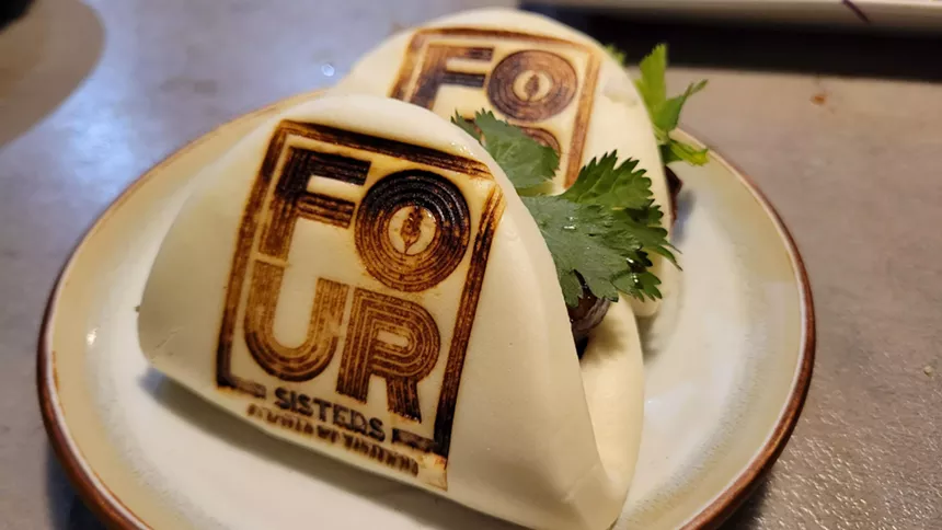 Two beer-braised pork belly bao