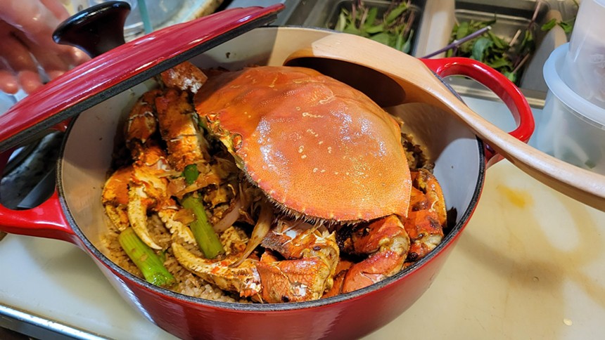 crab fried rice in a big red pot