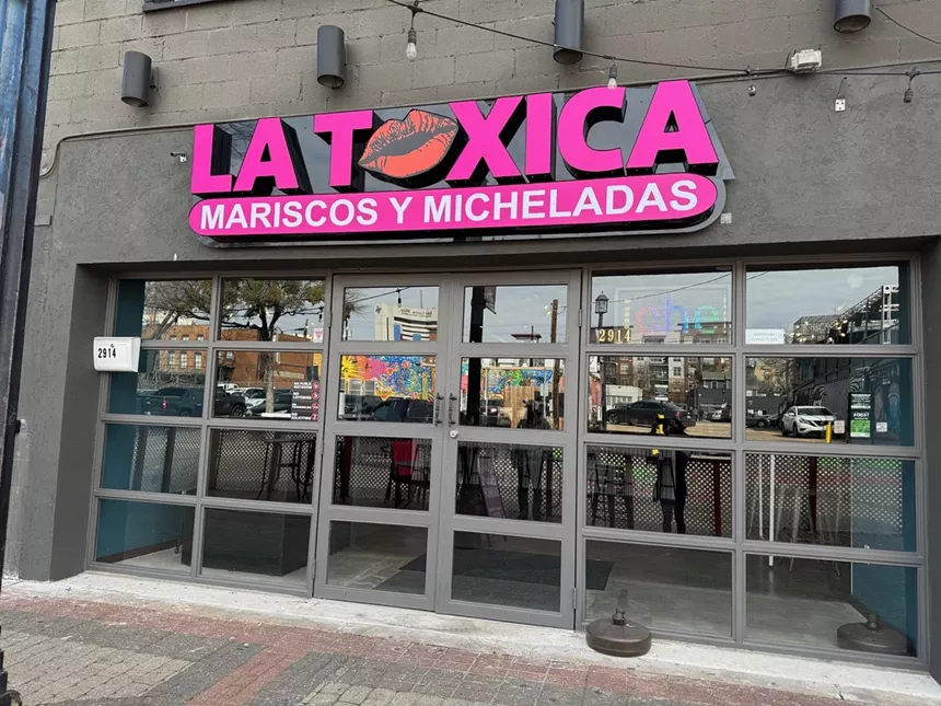 The exterior of La Toxica y Mariscos and Micheladas in Dallas.